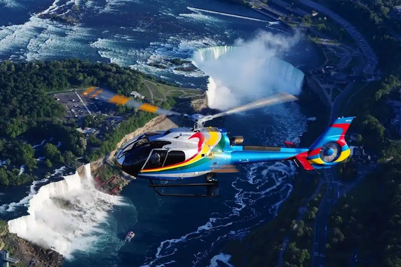 NIAGARA FALLS -  Flyover over the falls by helicopter Cover Image